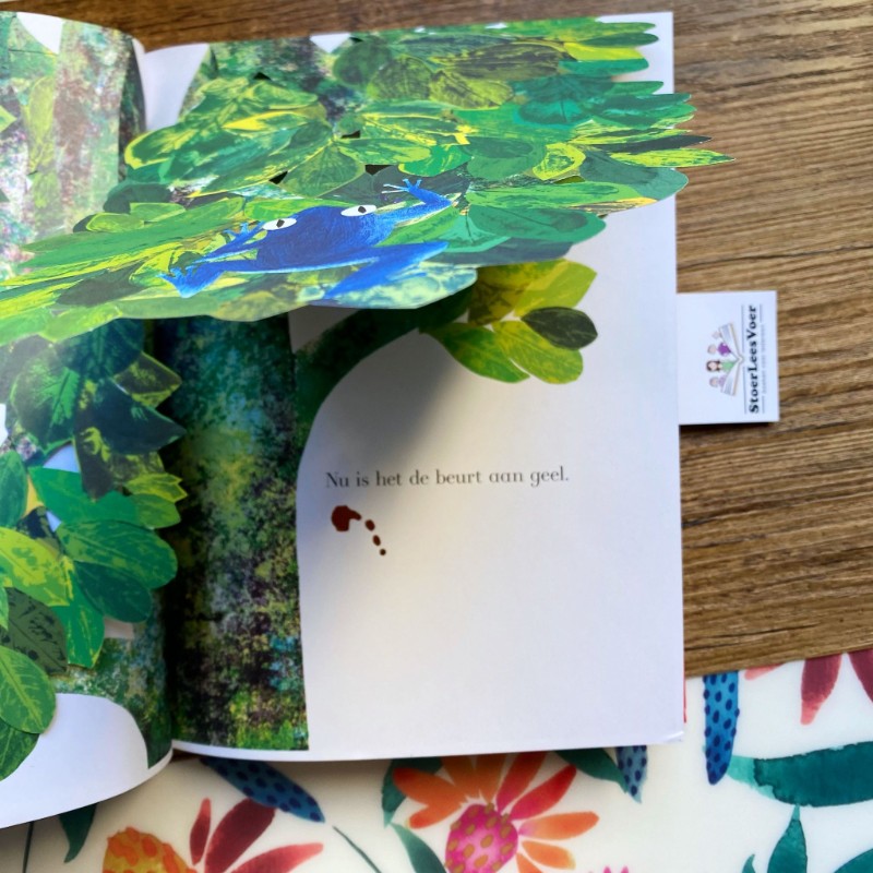 Kleuren, kleuren, overal kleuren is een bijzonder kartonboek met flapjes