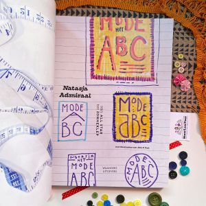 schutblad Het Mode ABC boek, een kleurrijk weetjesboek van All Star tot zonneklep